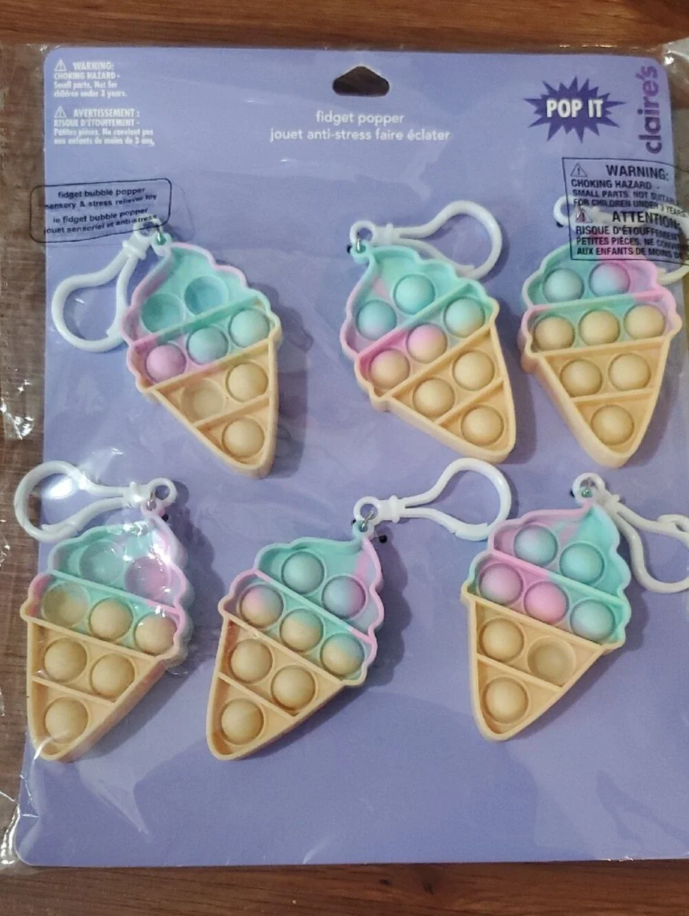 Claire's Pastel Ice Cream Cone Pop-It Keychains - Yellow, Pink, Blue, Green